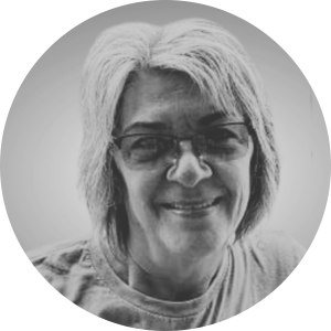 a man wearing a hat and glasses