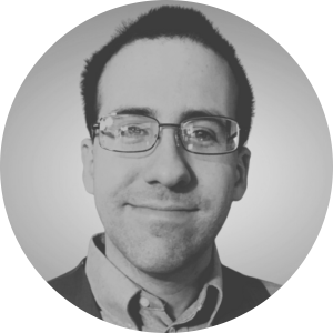 a man wearing a hat and glasses