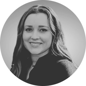 a man wearing a hat and glasses